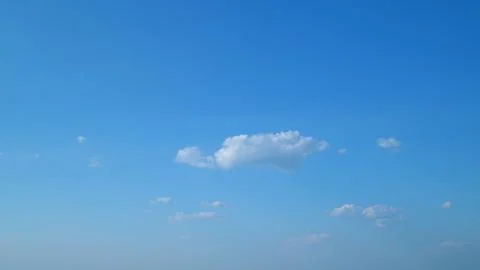 Dramatic cloudscape background. Nature weather blue sky. Timelapse. Stock Photos