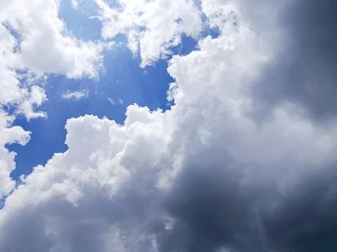 Dramatic Cloudscape with Blue Sky and Dark Storm Clouds Stock Photos
