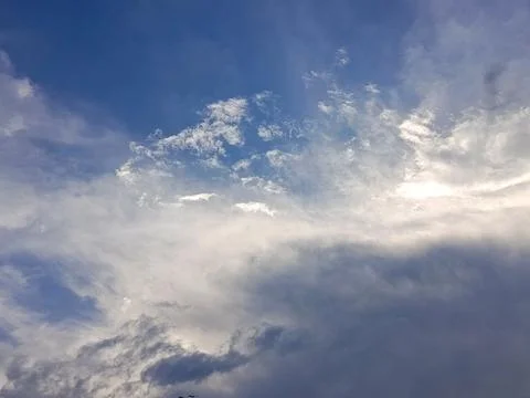 Dramatic Cloudscape in Blue Sky with Soft Sunlight Stock Photos