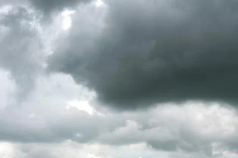 A dramatic cloudscape of dark sky with gloomy storm clouds Stock Photos