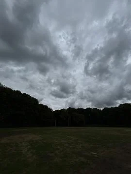 Dramatic Cloudscape with Dark Storm Clouds and Atmospheric Sky, evening Fotos de archivo