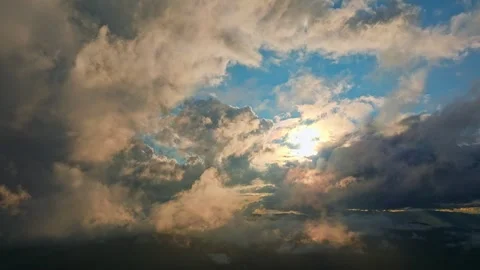 A Dramatic Cloudscape That Features Striking Light Breaks and Vivid Colors Stock Footage 318218169