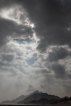 Dramatic Cloudscape &amp; Mountains in Oman, Sadah Stock Photos