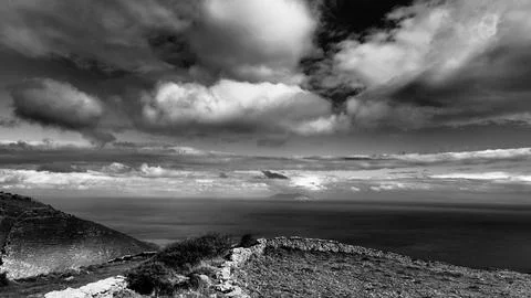 Dramatic cloudscape over the Aegean Sea - Kea Island black and white seascape Stock Photos