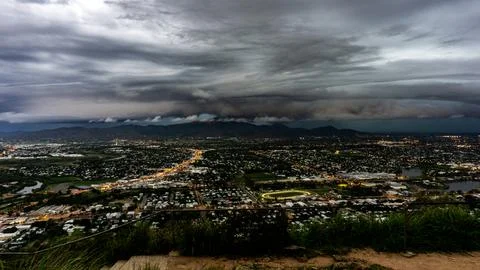 A Dramatic Cloudscape Over a Beautiful and Vibrant Urban Landscape Captured.. Stock Photos