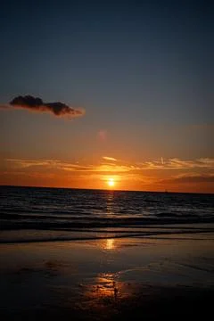 Dramatic Cloudscape Over Gulf Coast Ocean Horizon at Sunset Stock Photos