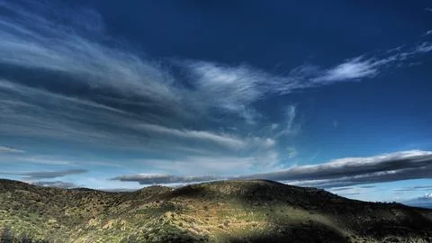 Dramatic Cloudscape Over Mediterranean Hills with Stylised Natural Landscape, Stock Photos