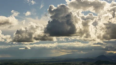 Dramatic cloudscape over plain and mountains of north east Italy, Friuli. Stock Footage 157807342