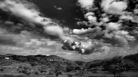 Dramatic Cloudscape Over Rural Kea Island, Greece - Black and White Landscape Stock Photos