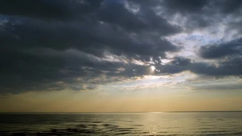 Dramatic cloudscape over the sea during sunset. Stock Footage 246334312