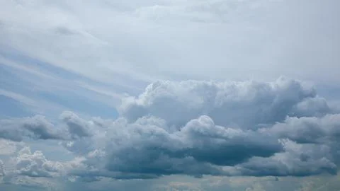 A Dramatic Cloudscape Set Against a Bright Blue Sky, Evoking a Sense of Wonder a 写真素材