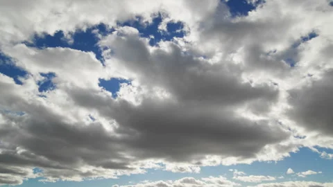 Dramatic Cloudscape with Sunlight Peeking Through Stock Footage 291979594