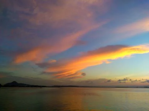 Dramatic cloudscape at sunrise Stock Photos
