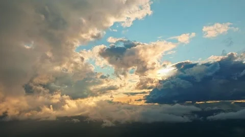 A Dramatic Cloudscape at Sunset featuring Vibrant Colors and Beautiful Stock Footage 318219316