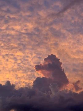 Dramatic Cloudscape at Sunset with Orange Sky Stock Photos