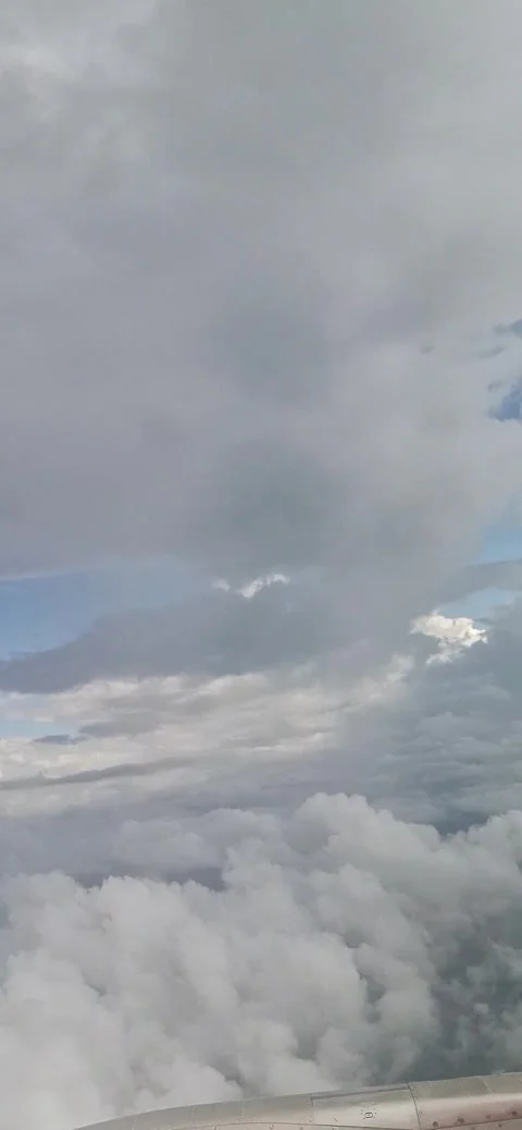 Dramatic cloudscape viewed from Airplane window Stock Footage 293057212