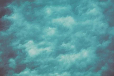 Dramatic cloudy blue sky. Overcast sky texture, abstract nature background Stock Photos