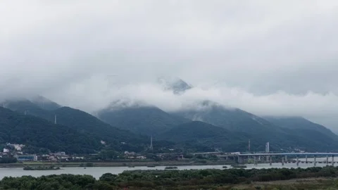 Dramatic Cloudy Mountain Landscape with Sideways Drone Motion in Korea 4K Stock Footage 319945390