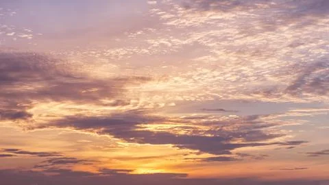 Dramatic cloudy pastel colored sunset sky Foto stock