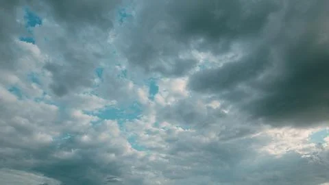 Dramatic Cloudy Skies with Beautiful Light Blue Patches, a Truly Captivating Sig Stock Photos