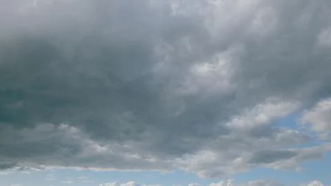 A Dramatic Cloudy Sky With Beautiful Sunlight Patches Artistically Dotted Throug 스톡 사진