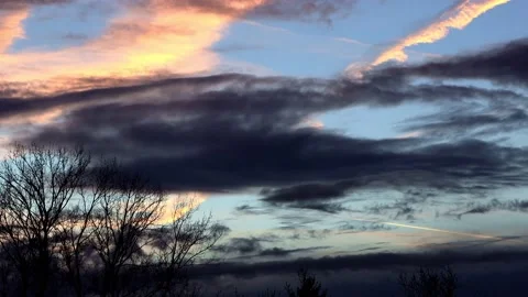 Dramatic cloudy sky blue yellow black, timelapse Stock Footage 194538234