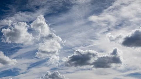 Dramatic cloudy sky with dynamic formations. Stock Photos