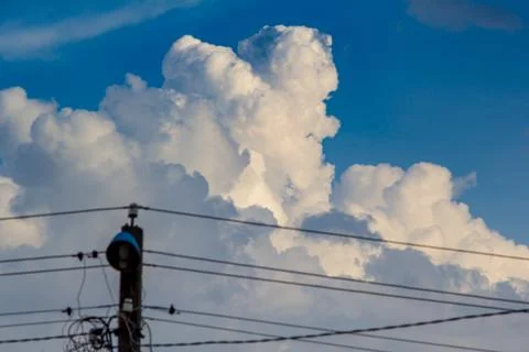 Dramatic cloudy sky. Fluffy clouds. Stock Photos