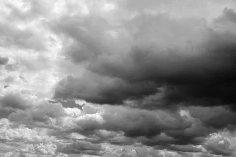 Dramatic cloudy sky, heaven. Grey clouds flying over horizon, cloudscape. Stock Photos