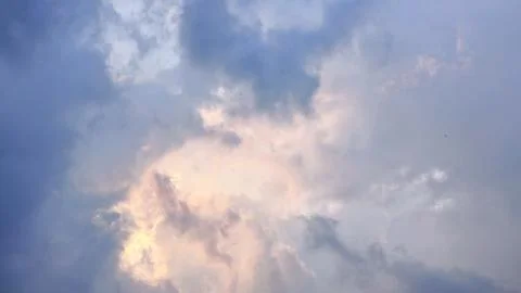 Dramatic cloudy sky with hidden sunlight. The beauty of natural phenomena Fotos de archivo