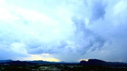 Dramatic Cloudy Sky Over Distant Mountains and Hills Stock Footage 311530526