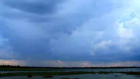 Dramatic Cloudy Sky Over Flat Landscape at Sunset Stock Footage 311529316
