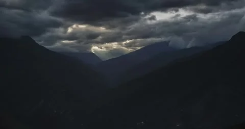 Dramatic Cloudy Sky Over Majestic Mountain Range Stock Footage 323301226