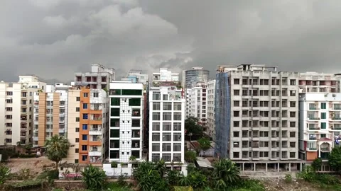 Dramatic Cloudy Sky Over Urban High Rise Buildings in Dhaka 4K Static Shot Stock Footage 308881794
