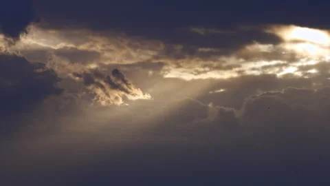 Dramatic Cloudy Sky with Sun Rays and Dark Storm Clouds Stock Footage 316982720