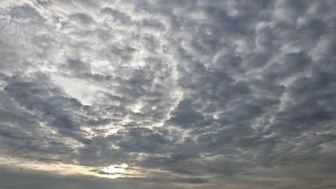 Dramatic Cloudy Sky with Sunlight Breaking Through Stock Photos