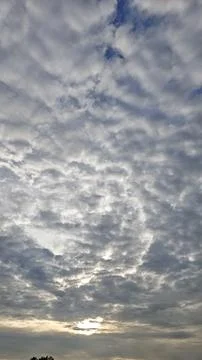 Dramatic Cloudy Sky with Sunlight Breaking Through Stock Photos