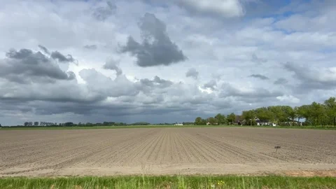 Dramatic Cloudy Sky with Sunlight Over the Netherlands Atmospheric Cloudscape Stock-Footage 343001198