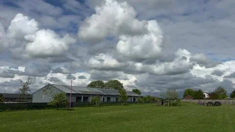Dramatic Cloudy Sky with Sunlight Over the Netherlands Atmospheric Cloudscape Stock-Footage 343001812