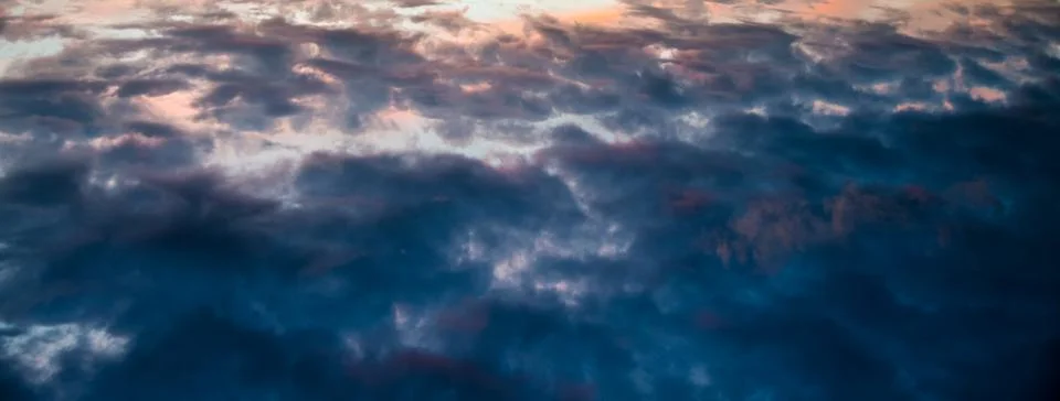 Dramatic Cloudy Sky at Sunrise Stock Photos