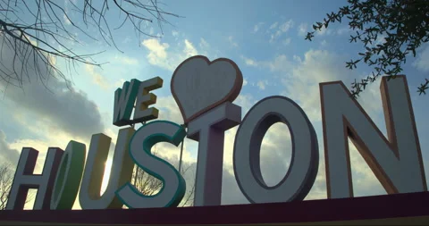 Dramatic Cloudy Sky Time-lapse Over 'We Love Houston' Sign Stock Footage 303783957