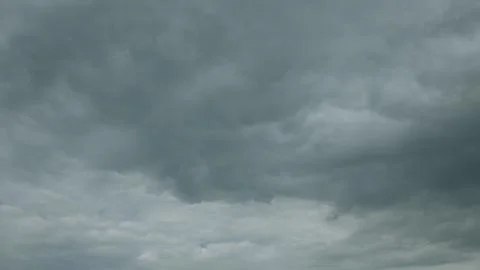 A Dramatic Cloudy Sky with Various Shades of Gray Enhancing the Overall Atmosphe Stock Photos