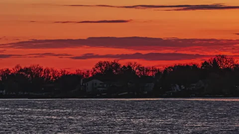 A Dramatic Cloudy Sunrise With A Orange Horizon In The Sky Stock-Footage 130892617