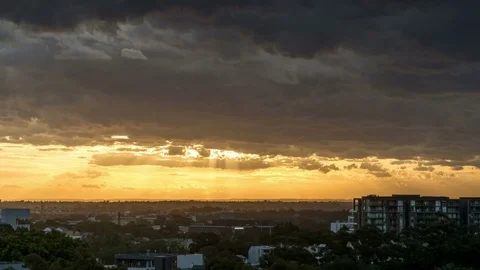 Dramatic cloudy sunset time lapse in city landscape Stock Footage 84171986