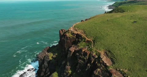 Dramatic coastal cliff overlooking the ocean in East London South Africa with Stock Footage 326053536