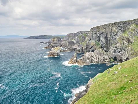 Dramatic Coastal Cliffs Above the Ocean 写真素材