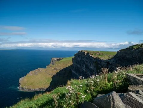 Dramatic coastal cliffs above the ocean Photos