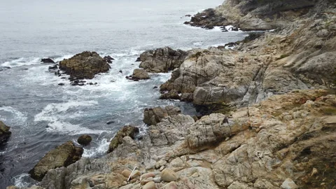 Dramatic coastal cliffs, rainy day, pacific ocean Stock Footage 111753955