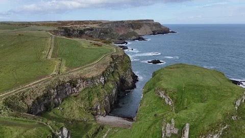 Dramatic Coastal Cliffs with Rugged Shoreline Stock Photos