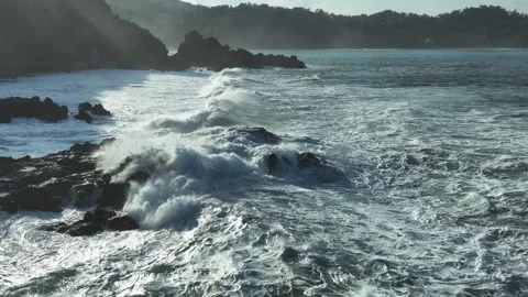 Dramatic Coastal Landscape with Ocean Surf at Sunset Stock Footage 338313537